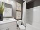 Modern bathroom with tub, shower, and updated vanity at 7175 Linden Dr, South Fulton, GA 30349