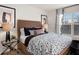 Cozy bedroom with queen-size bed and window at 7175 Linden Dr, South Fulton, GA 30349