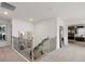 Upstairs hallway with elegant railing and mirrors at 7175 Linden Dr, South Fulton, GA 30349
