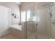 Relaxing bathroom with soaking tub and walk-in shower at 952 Sweetwater Bridge Cir, Douglasville, GA 30134