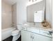 Bathroom with a marble-topped vanity and light walls at 1731 N Springs Dr, Dunwoody, GA 30338