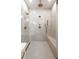 Large walk-in shower with multiple shower heads and built-in bench at 1731 N Springs Dr, Dunwoody, GA 30338