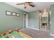 Spacious playroom with a toy train set and access to upper level at 42 Oak Leaf Dr, Dallas, GA 30157