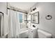 Clean bathroom, includes a shower/tub combo and vanity at 853 Hargis Se St, Atlanta, GA 30315