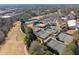 Aerial view of community with tennis courts and pool at 110 Pro Ter, Johns Creek, GA 30097