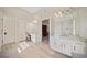 Elegant bathroom with double vanity, soaking tub, and walk-in shower at 110 Pro Ter, Johns Creek, GA 30097