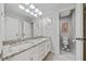 Bright bathroom with double sinks and granite countertop at 110 Pro Ter, Johns Creek, GA 30097