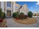 Elegant front entrance with stone steps and landscaping at 110 Pro Ter, Johns Creek, GA 30097