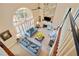 High-ceilinged living room with stone fireplace, viewed from above at 110 Pro Ter, Johns Creek, GA 30097