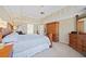 Main bedroom features a king-size bed and ample closet space at 110 Pro Ter, Johns Creek, GA 30097