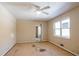 Simple bedroom with ceiling fan and wood flooring at 190 Highland Blvd, Stockbridge, GA 30281