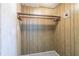 Small closet with a wooden hanging rod at 190 Highland Blvd, Stockbridge, GA 30281