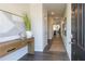 Bright entry hall with wood-look floors and a runner at 2639 Cacao Sq, Acworth, GA 30101