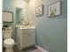 Small powder room with a single sink vanity and toilet at 2639 Cacao Sq, Acworth, GA 30101