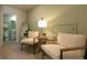 Cozy sitting area with two armchairs and a view of a bathroom at 2639 Cacao Sq, Acworth, GA 30101