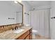 Bathroom with shower/tub combo and granite vanity at 555 Winder Trl, Canton, GA 30114