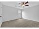 Simple bedroom with ceiling fan and carpet at 555 Winder Trl, Canton, GA 30114