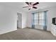 Bedroom with ceiling fan and light blue curtains at 555 Winder Trl, Canton, GA 30114