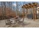 Back deck with pergola, table, chairs, and grill at 555 Winder Trl, Canton, GA 30114