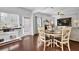 Bright dining area with hardwood floors and round table at 555 Winder Trl, Canton, GA 30114