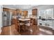 Island kitchen with granite countertops and stainless steel appliances at 555 Winder Trl, Canton, GA 30114