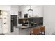 Contemporary kitchen with sleek cabinetry and dark countertops at 6305 Shannon Pkwy # 203, Union City, GA 30291