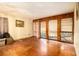 Living room with hardwood floors and wood paneled walls at 1491 Boulderwoods Se Dr, Atlanta, GA 30316