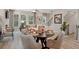 Bright dining area with seating for four and hardwood floors at 214 Maycrest Path, Tucker, GA 30084