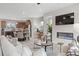 Open living area showcasing a cozy seating arrangement and kitchen at 214 Maycrest Path, Tucker, GA 30084