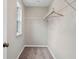 Spacious walk-in closet with wire shelving and hanging rods at 214 Maycrest Path, Tucker, GA 30084