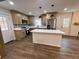 Bright kitchen with stainless steel appliances and island at 1938 Highway 212 Sw, Conyers, GA 30094
