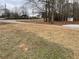 Expansive front yard with mature trees at 1938 Highway 212 Sw, Conyers, GA 30094