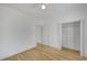 Bright bedroom with wood floors and ample closet space at 200 Holly Chase Ct, Canton, GA 30114