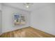 Spacious bedroom with hardwood floors and large window at 200 Holly Chase Ct, Canton, GA 30114