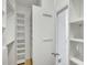 Spacious walk-in closet with built-in shelving at 200 Holly Chase Ct, Canton, GA 30114