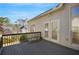 Wooden deck with chairs, offering views of the backyard at 200 Holly Chase Ct, Canton, GA 30114
