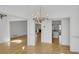 Bright dining room with hardwood floors and chandelier at 200 Holly Chase Ct, Canton, GA 30114