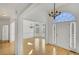 Bright entryway with hardwood floors and chandeliers at 200 Holly Chase Ct, Canton, GA 30114