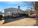 Two-story house with deck, backyard, and landscaping at 200 Holly Chase Ct, Canton, GA 30114