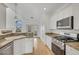 Modern kitchen with granite countertops and stainless steel appliances at 200 Holly Chase Ct, Canton, GA 30114