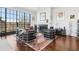 Living room with hardwood floors and fireplace at 230 Vickery Falls Dr, Roswell, GA 30075