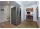 Stainless steel refrigerator in kitchen with view into living area at 3812 Stonewall Se Ter, Atlanta, GA 30339