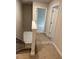 Hallway with carpet leads from the stairs to the bedrooms and bathrooms at 3990 Cavalier Way, Duluth, GA 30097