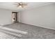 Spacious living room with neutral walls and carpet at 4055 Cooper Ridge Se Ct, Smyrna, GA 30080