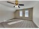 Bedroom with two windows, ceiling fan and neutral walls at 1019 Braelin Ct, Woodstock, GA 30189