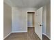 Small bedroom with closet and access to another room at 1019 Braelin Ct, Woodstock, GA 30189