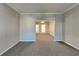 Open dining room with neutral decor and view of Gathering room at 1019 Braelin Ct, Woodstock, GA 30189