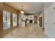 Eat-in kitchen with white cabinets, stainless steel appliances, and tile floor at 1019 Braelin Ct, Woodstock, GA 30189