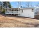 Back of the house showing a large deck at 3920 Stone Creek Cir, Cumming, GA 30041