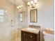 Bathroom with a walk-in shower and granite vanity top at 882 Edgewater Trl, Atlanta, GA 30328